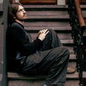 Citizen Papes sat on the stairs 